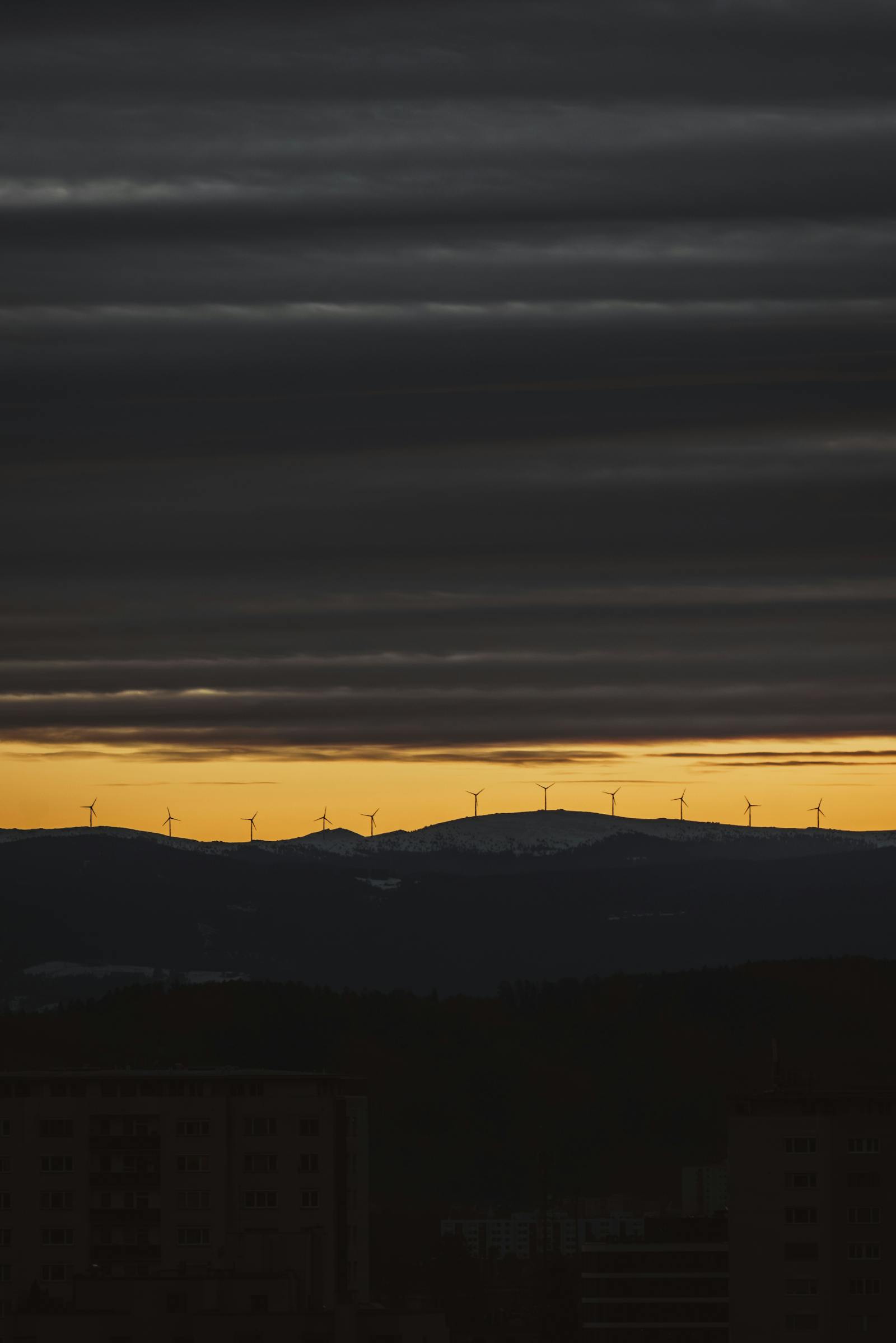 majestic twilight horizon with wind turbines