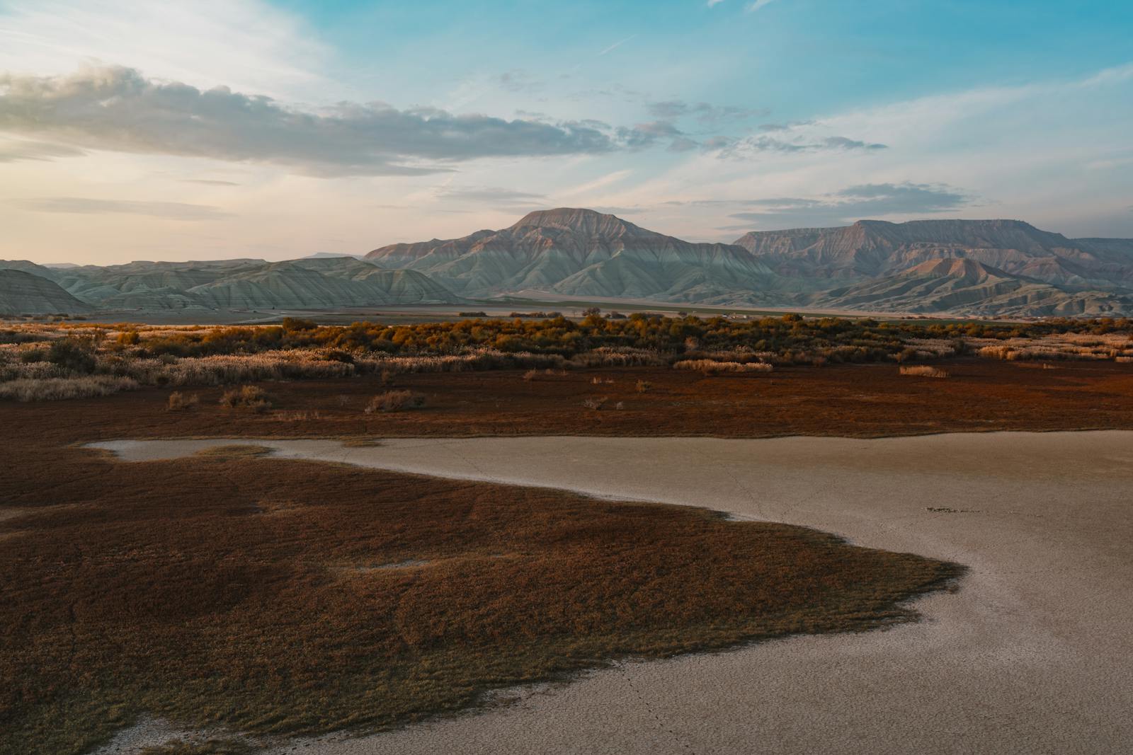 Beautiful mountainous landscape with sunset colors and serene scenery.