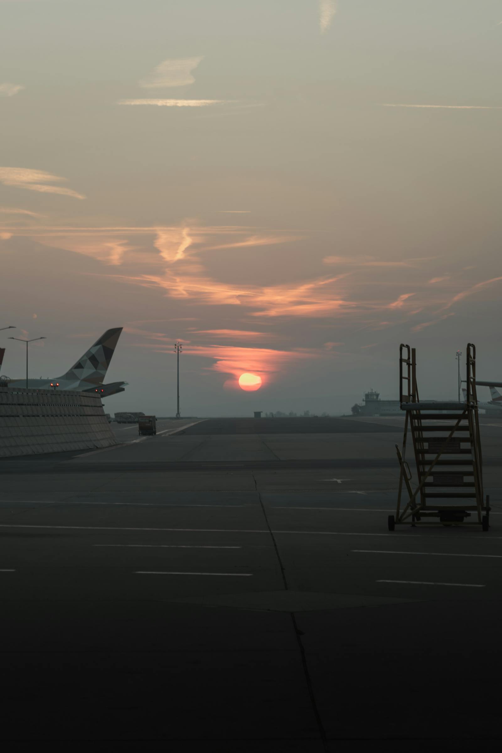 A breathtaking sunset view at an airport runway in Schwechat, Austria.