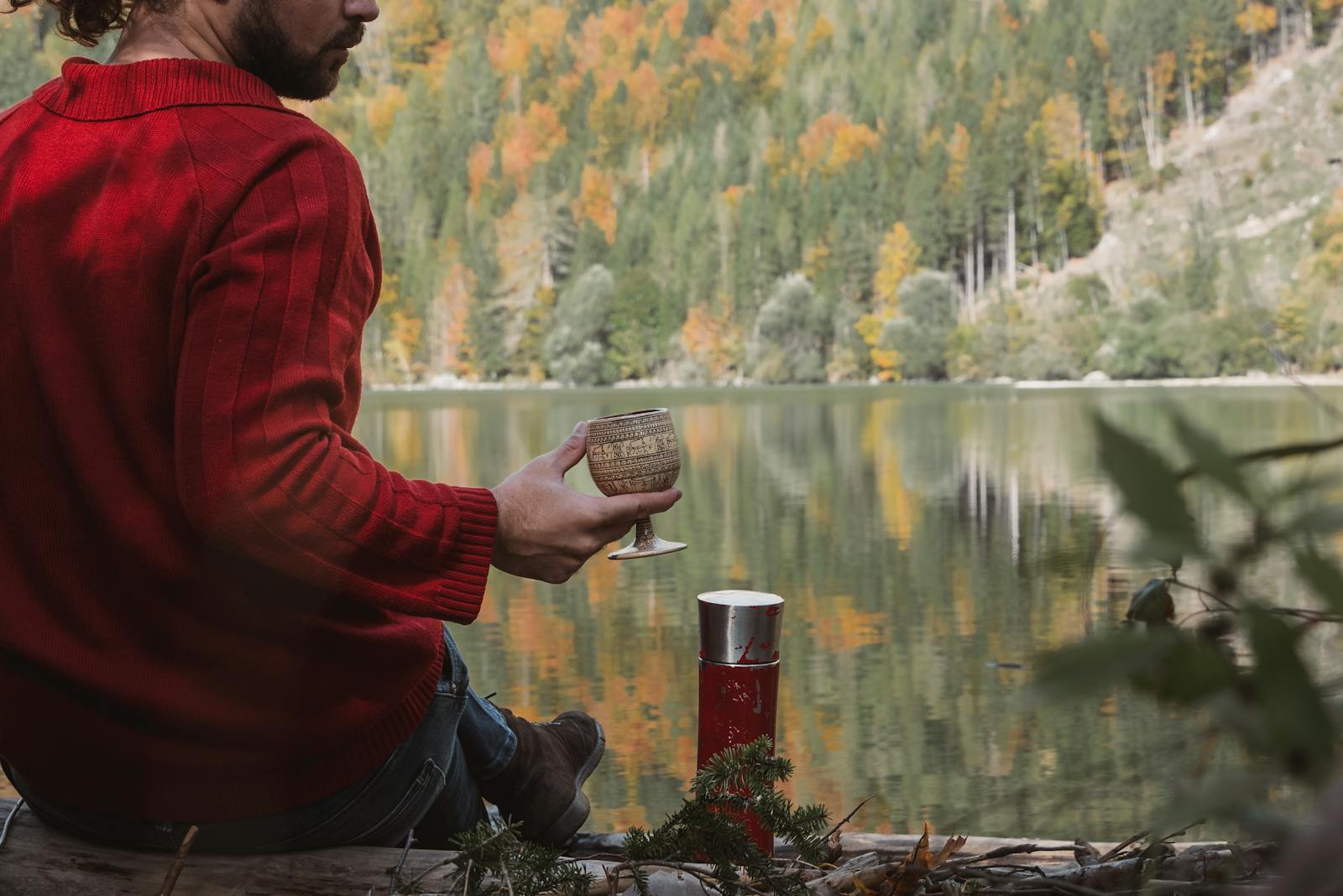 Relaxing autumn moment by a serene lake in Eisenerz, Austria.