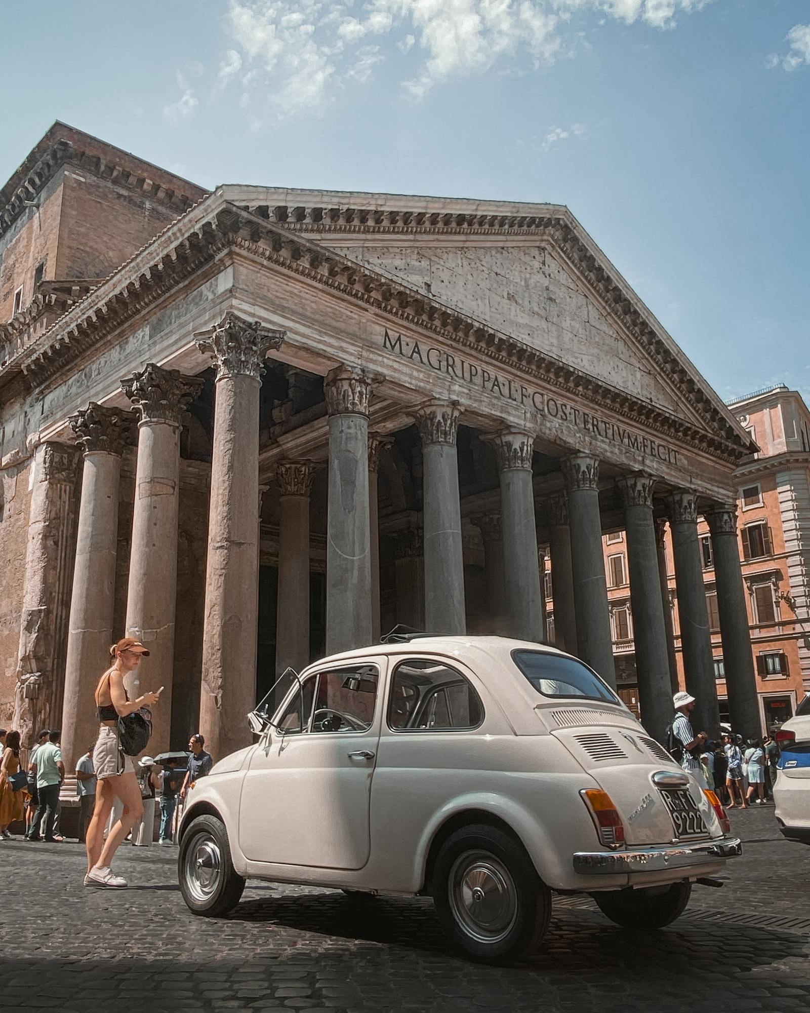 Vintage car parked at the Pantheon in Rome, capturing the essence of Italian travel.