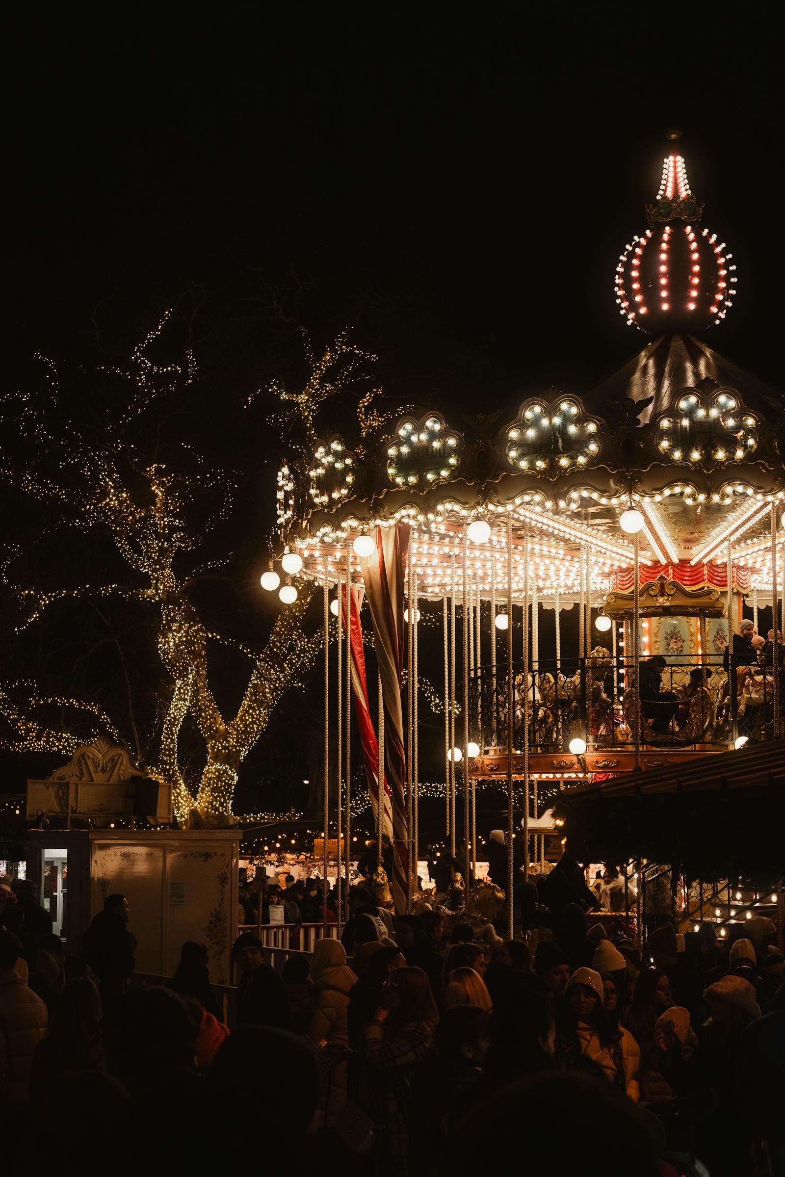 bright carousel at festive night market