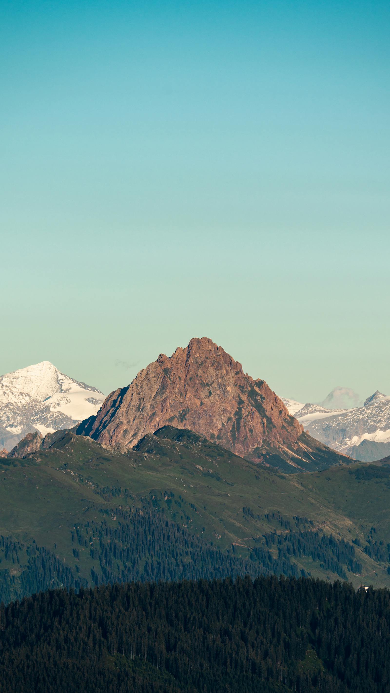 A breathtaking view of Alpine peaks in Tyrol, Austria, perfect for scenic wallpapers.