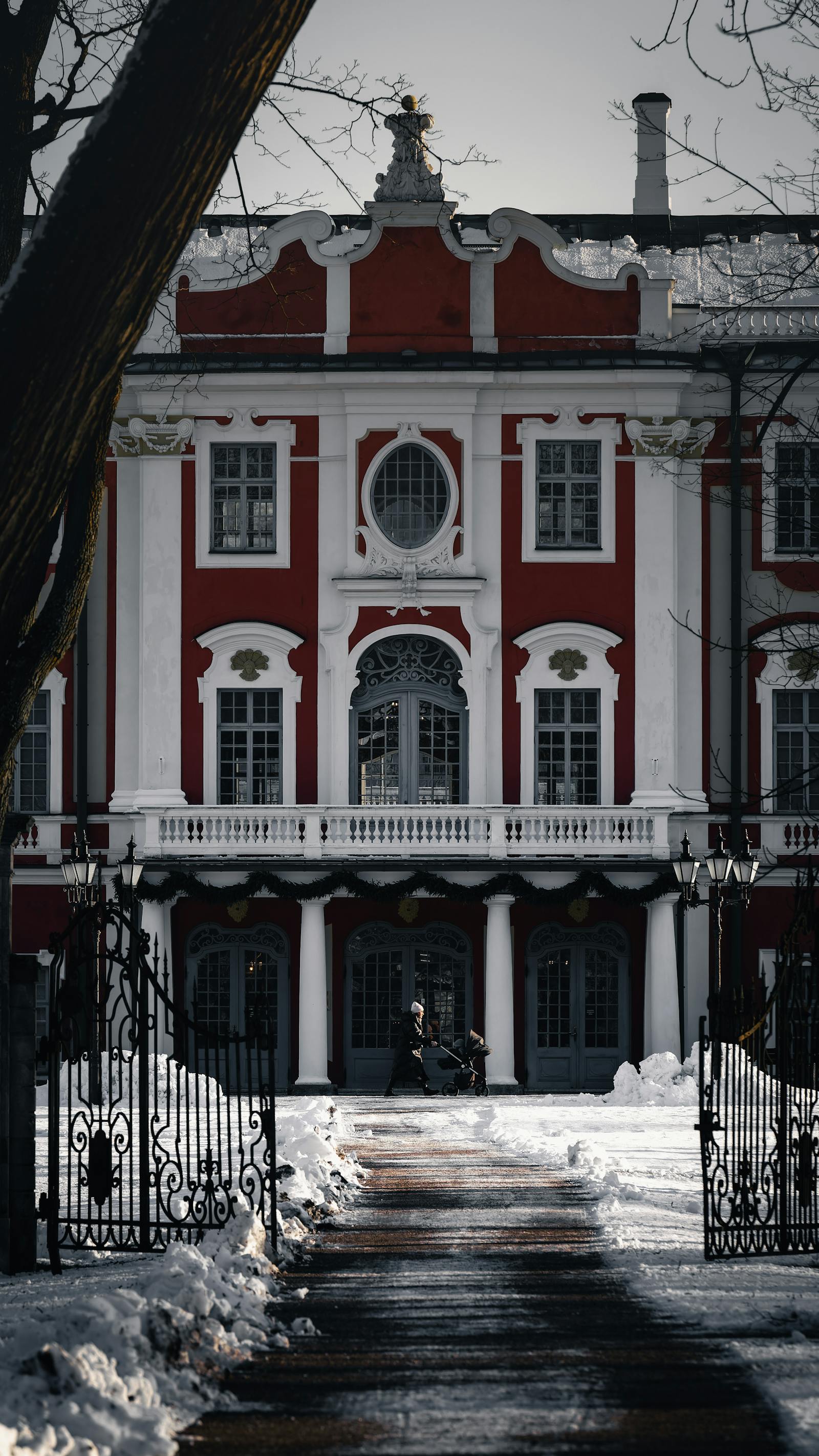 A winter view of Kadriorg Palace in Tallinn, Estonia, under a clear sky.