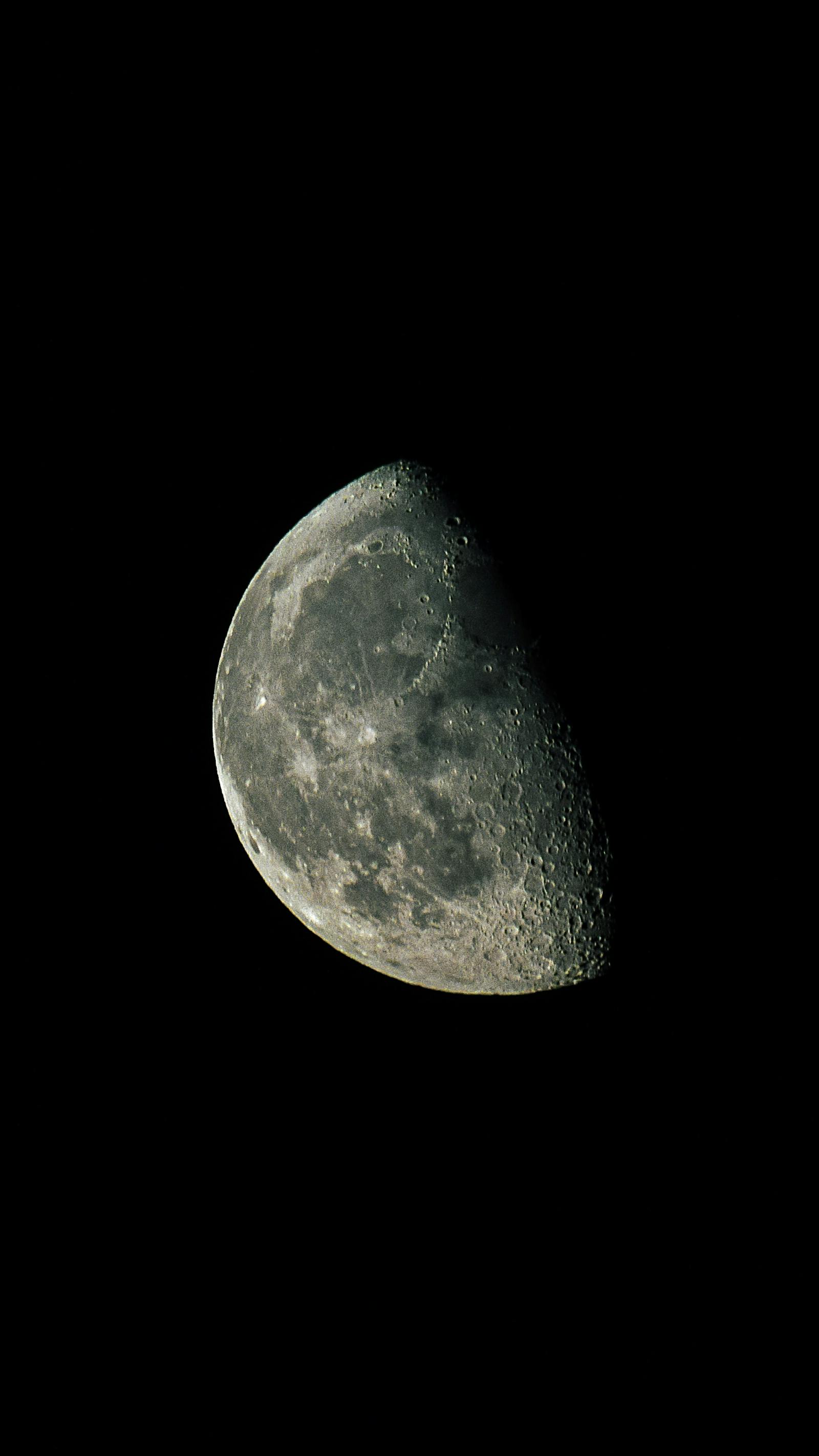 Stunning close-up of the moon showcasing its craters against a dark night sky, perfect for space enthusiasts.