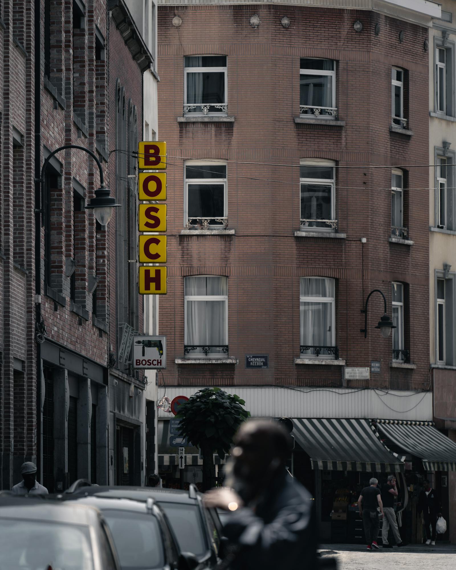 Street view of urban architecture with Bosch sign in Brussels, Belgium.