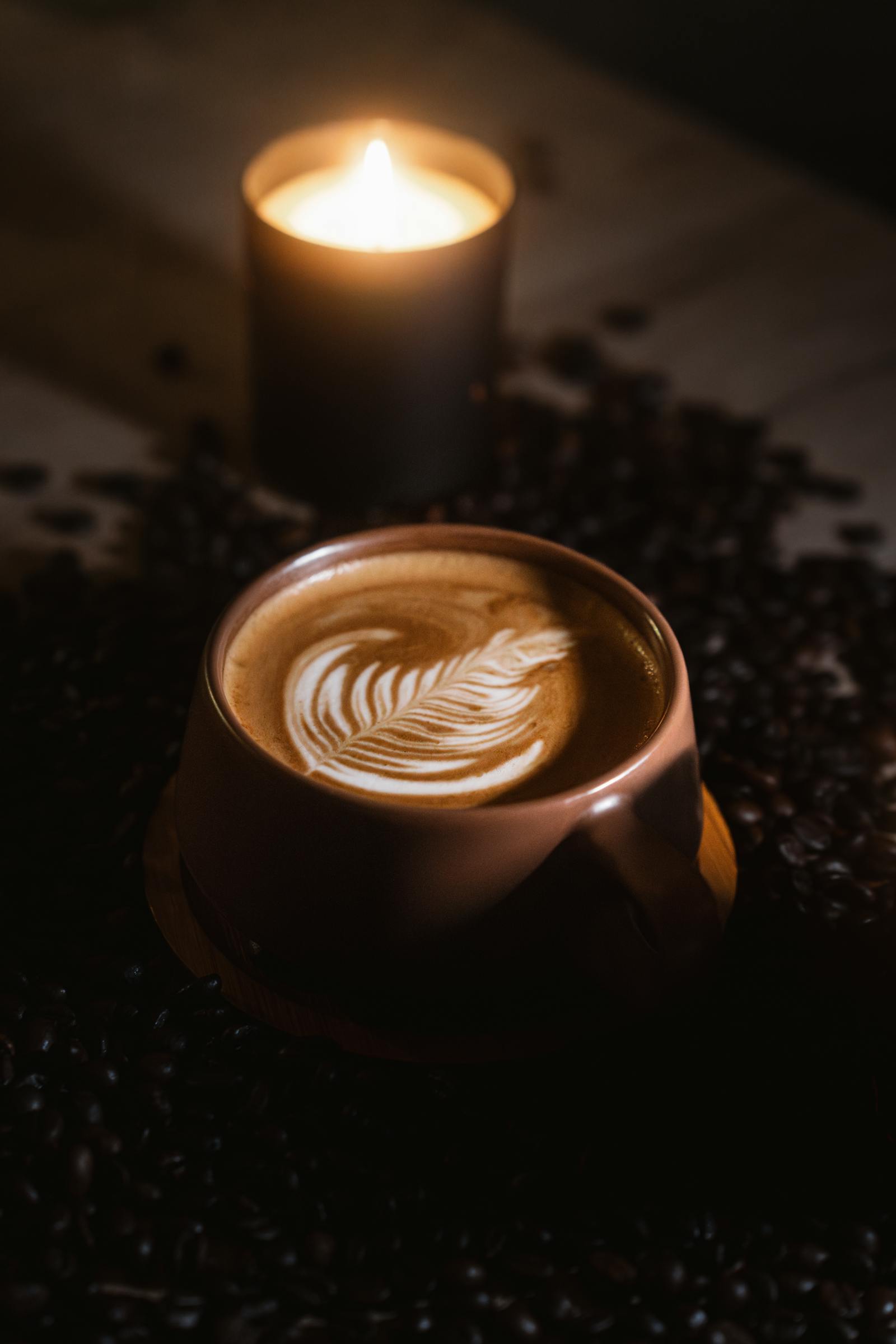 cozy latte art with candlelight ambiance